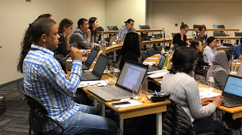 Trainees sitting at laptops