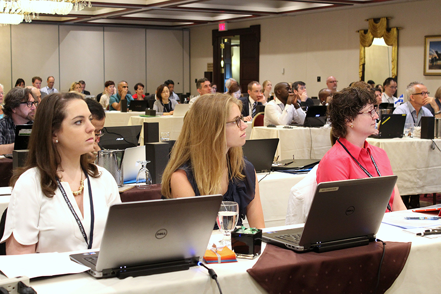 Research Specialist in TIMSS Science Bethany Fishbein, Research Specialist in TIMSS Mathematics Kerry Cotter, and Assistant Research Director, TIMSS Coordinator Victoria Centurino reviewed TIMSS 2015 International Report exhibits.