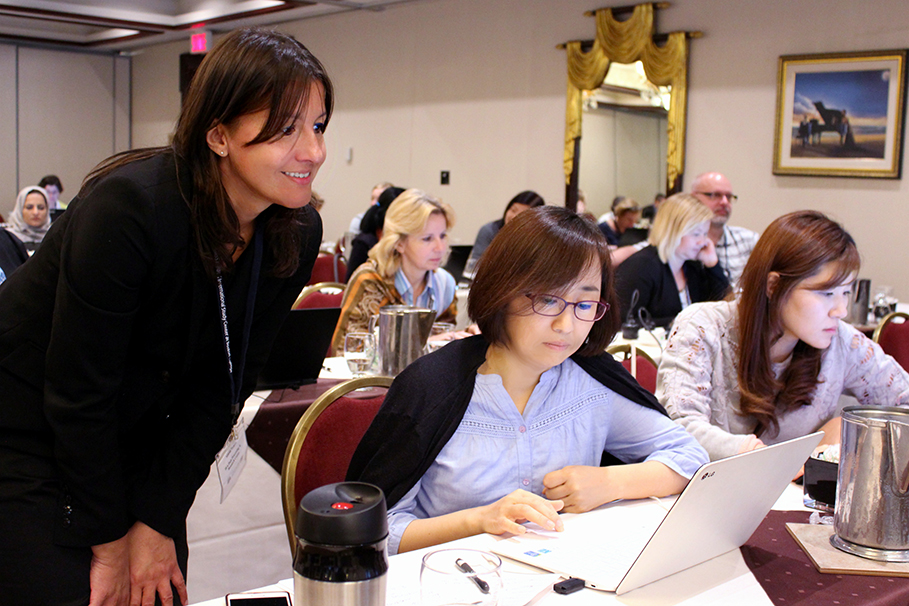 Milena Taneva of the IEA checked in with Kyongah Sang of the Republic of Korea during International Database Analyzer training.