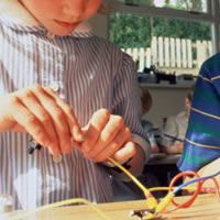 student working with cables